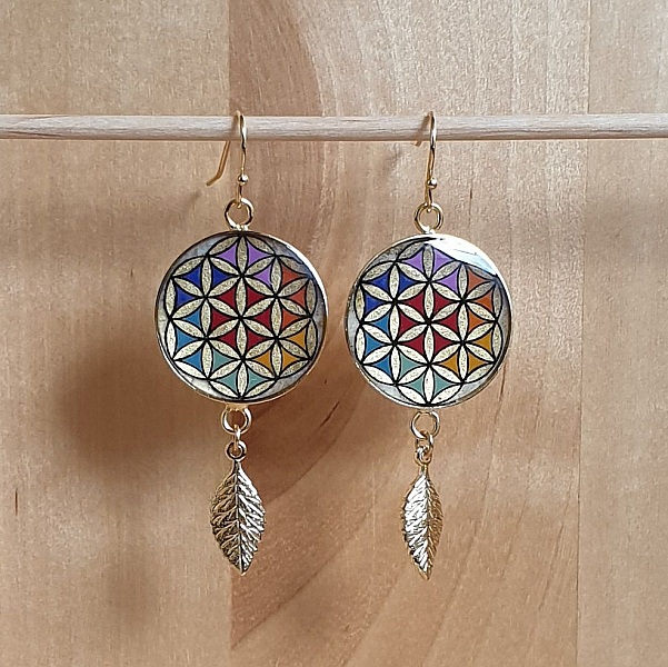 Boucles d'oreille pendantes fleur de vie et feuille or