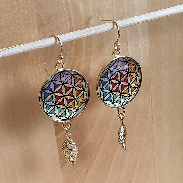 Boucles d'oreille pendantes fleur de vie et feuille or