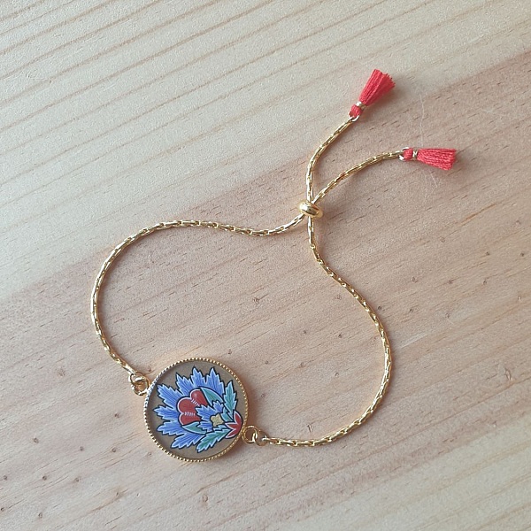 Bracelet r&eacute;glable enluminure fleur orientale bleue