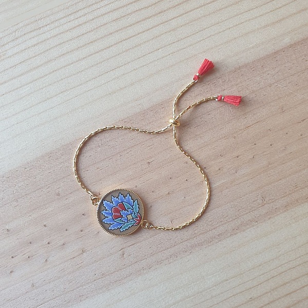 Bracelet r&eacute;glable enluminure fleur orientale bleue