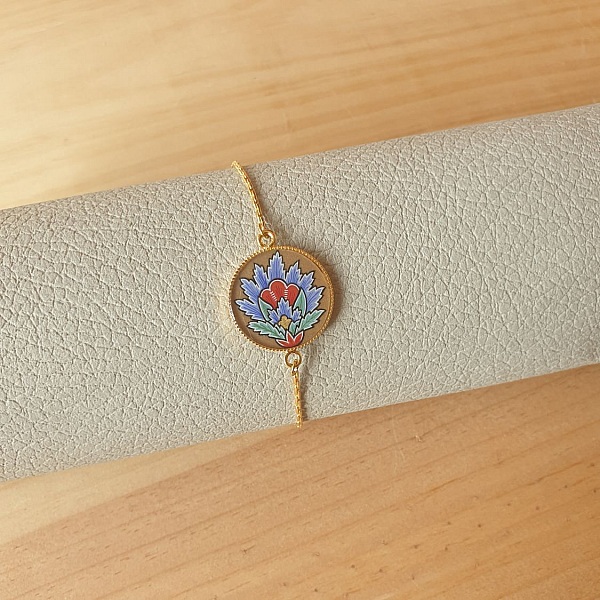 Bracelet r&eacute;glable enluminure fleur orientale bleue