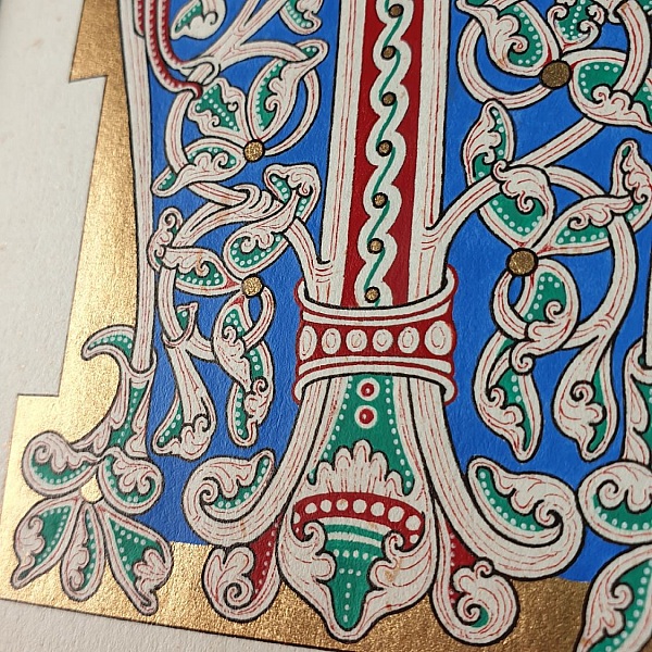 Belyst bokstav M i romansk stil