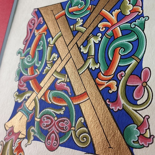 Romansk illuminert bokstav X