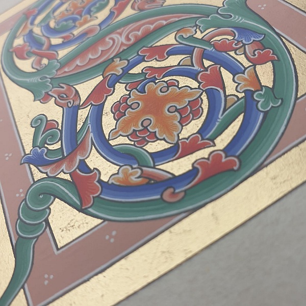 Opplyst bokstav S i romansk stil